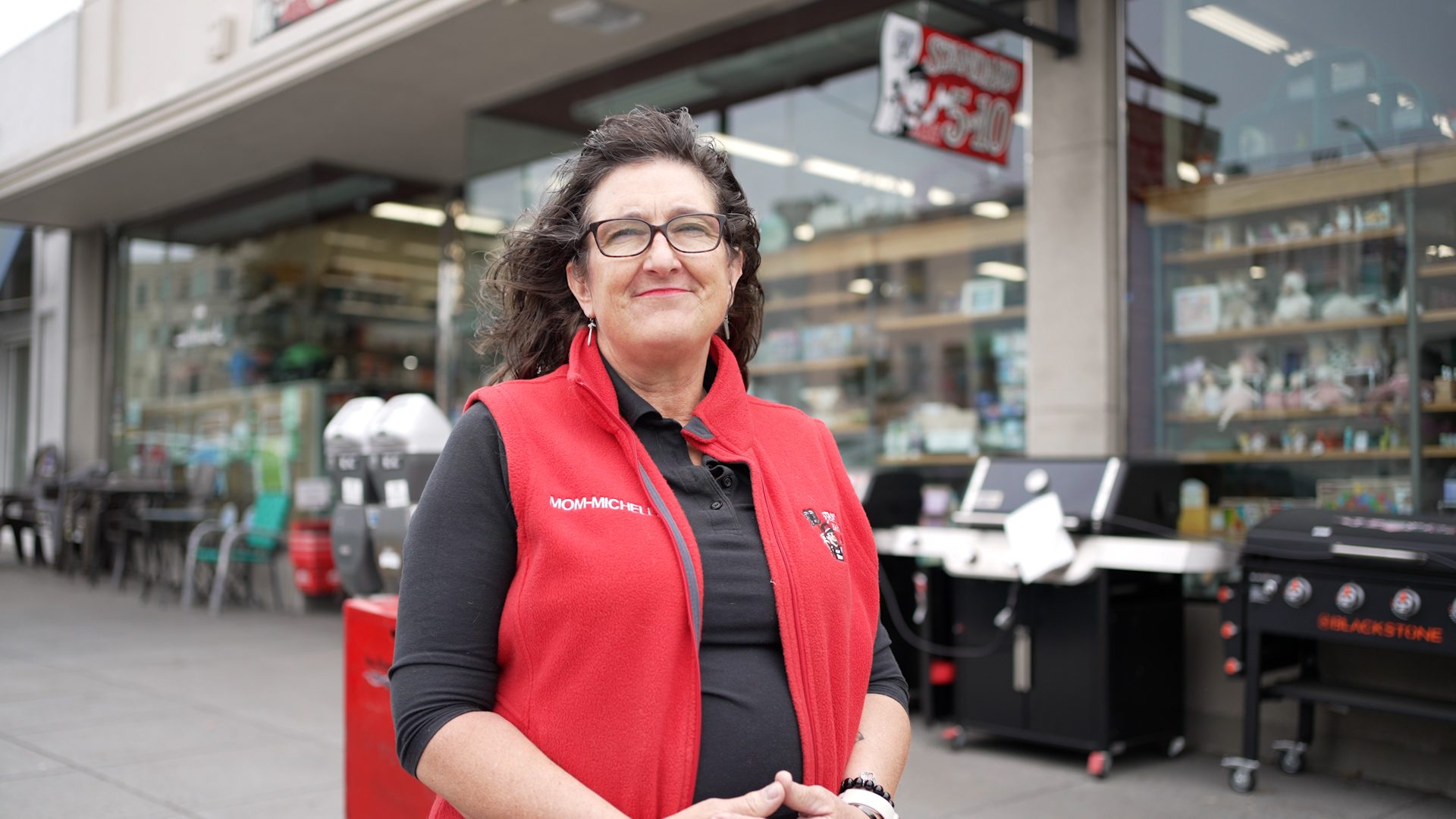Michelle, a Stan’s Ace team member, in a red Ace vest